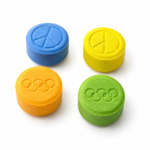 Close up view of round compressed botanical tablets on a clean white surface